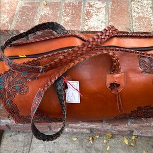 Handcrafted Leather Bag with Floral Design